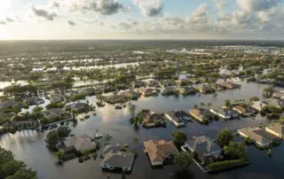 Flooding in Florida caused by tropical storm from hurricane Debby. Suburb houses in Laurel Meadows residential community surrounded by flood waters in Sarasota. Aftermath of natural disaster stock photo