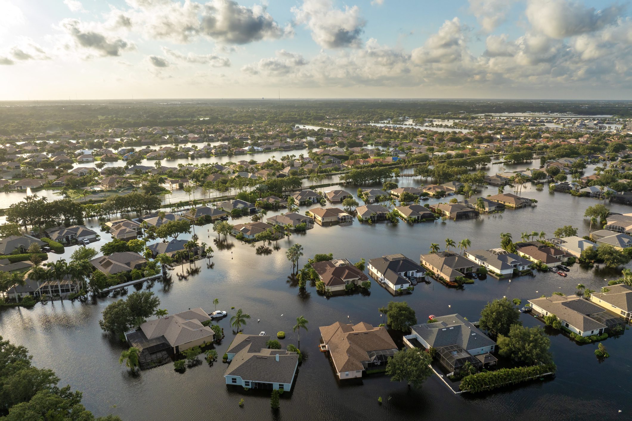 Flooding in Florida caused by tropical storm from hurricane Debby. Suburb houses in Laurel Meadows residential community surrounded by flood waters in Sarasota. Aftermath of natural disaster stock photo